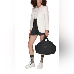 Marc Jacobs quilted puffer Travel Bag with guitar crossbody strap in black